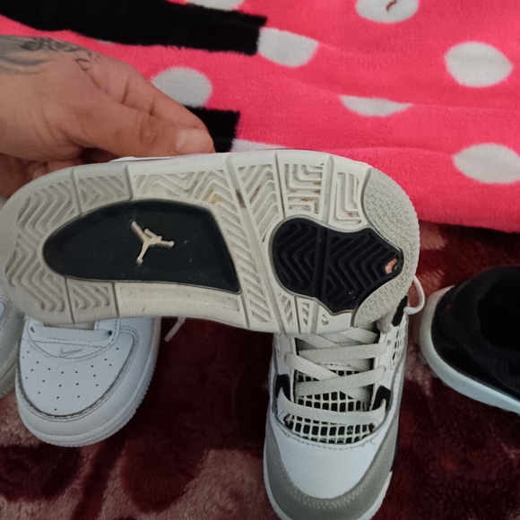 Baby /kid shoes made by Jordan size 7c all black Jordan Xl,4 \'s,nikes,air forces